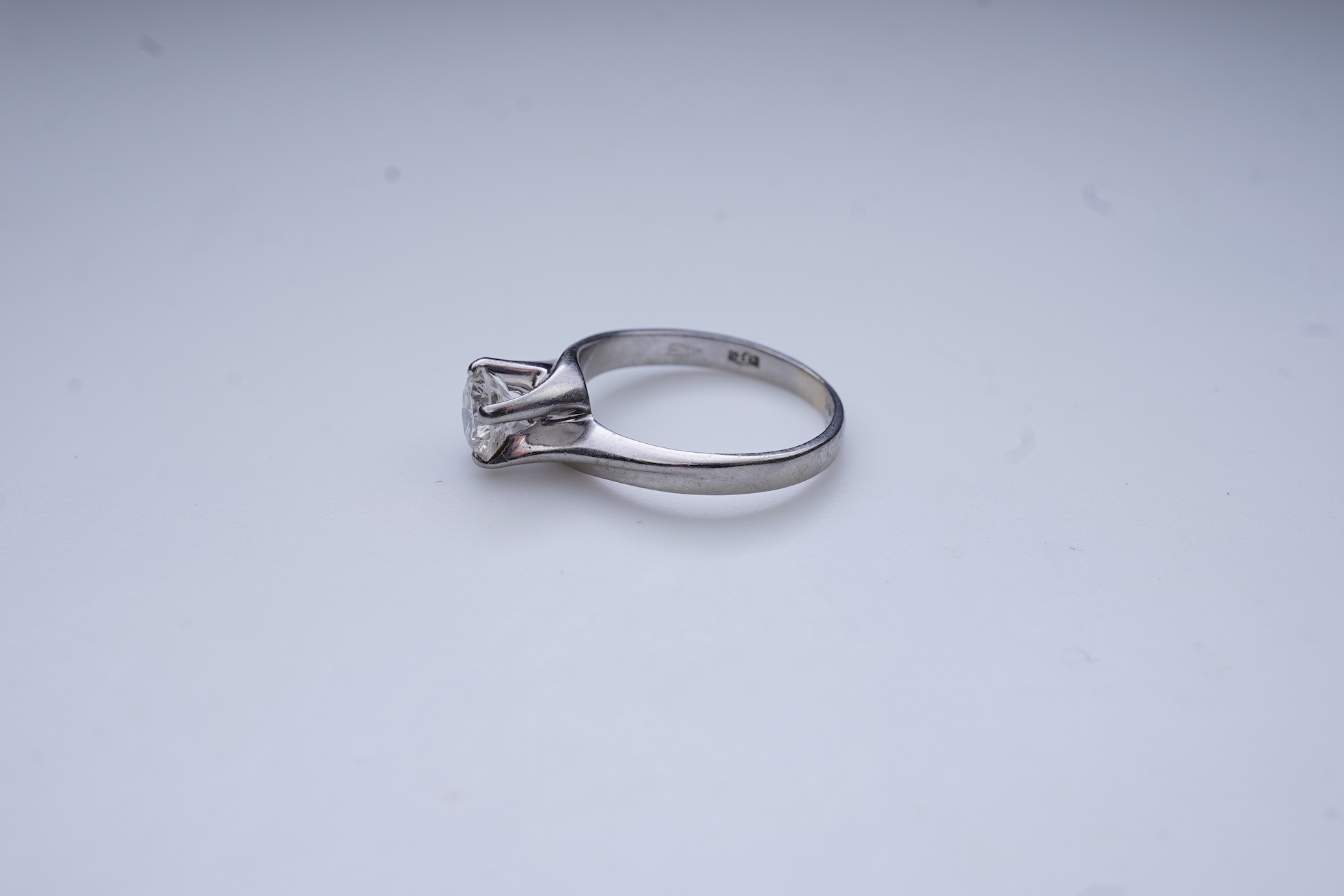 A diamond solitaire ring